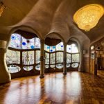 Ornate interior of Casa Batlló in Barcelona showcasing Gaudí's unique architecture.